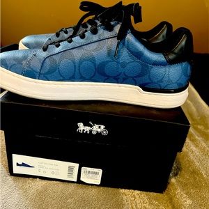 Men Coach shoes one wore them once in good condition